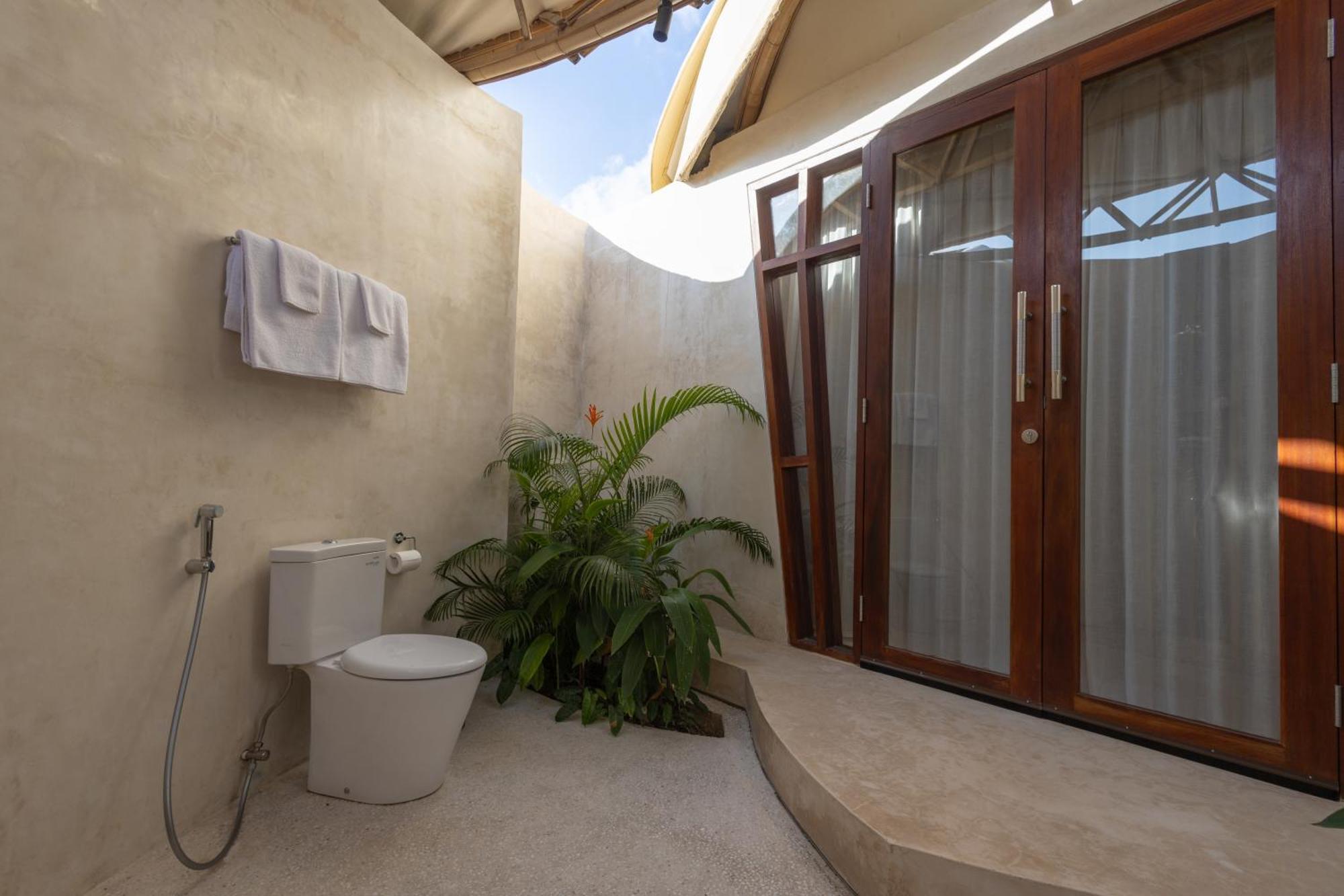 Nuanu Suites & Accommodations Tanah Lot  Phòng bức ảnh